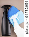 Black and white bottle and cleaning rags. 94732954