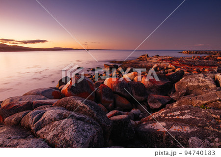 Binalong Bay Sunset in Tasmania Australia 94740183