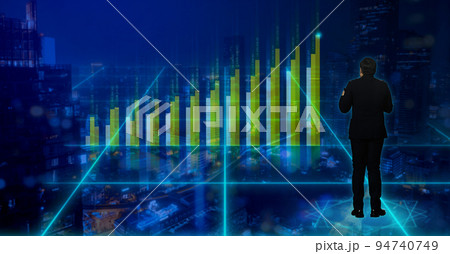 Back view of businessman wearing formal suit standing on smart city watches financial graph diagram. Concept of Business investment technology. Double exposure. Back view of businessman wearing formal suit standing on smart city watches financial graph diagram. Concept of Business investment technology. Double exposure. 94740749