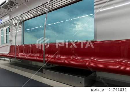 Empty seats commuter with Red color interior inside in the subway train. Empty seats commuter with Red color interior inside in the subway train. 94741832