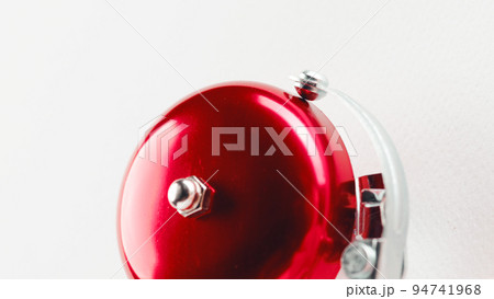 Red fire alarm bell on the white wall in a office Red fire alarm bell on the white wall in a office 94741968