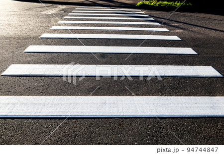 Pedestrian crossing with white marking lines onの写真素材