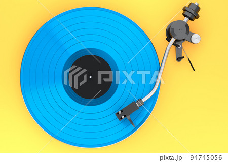 Vinyl record player or DJ turntable with retro vinyl disk on yellow background. 94745056