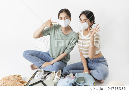 preparing for a summer trip concept series_korean beautiful asian young women wearing mask 94753386