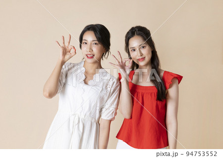 summer vacation trip with friends concept series_korean beautiful asian young women with hand motions summer vacation trip with friends concept series_korean beautiful asian young women with hand motions 94753552
