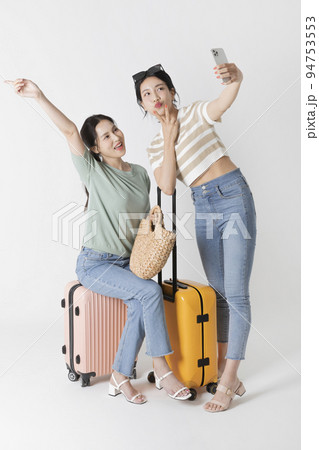 preparing for a summer trip concept series_korean beautiful asian young women taking a selfie 94753553