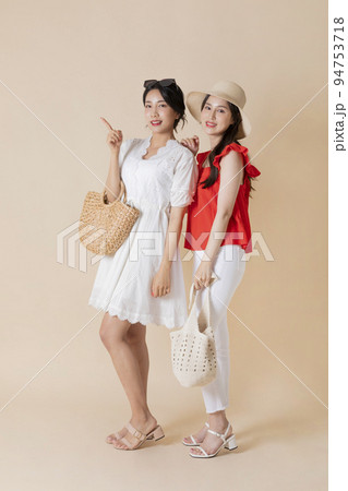 summer vacation trip with friends concept series_korean beautiful asian young women with hand motions 94753718