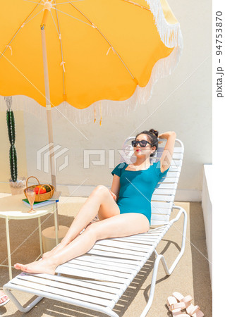 summer vacation trip with friends concept series_korean beautiful asian young women taking a rest on the sunbed summer vacation trip with friends concept series_korean beautiful asian young women taking a rest on the sunbed 94753870
