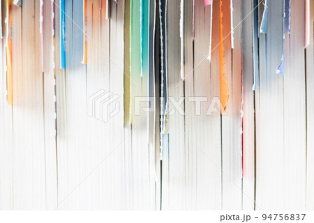 Edges of closed book with bookmaks close-up Edges of closed book with bookmaks close-up 94756837