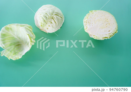 cabbage on the green background cabbage on the green background 94760790