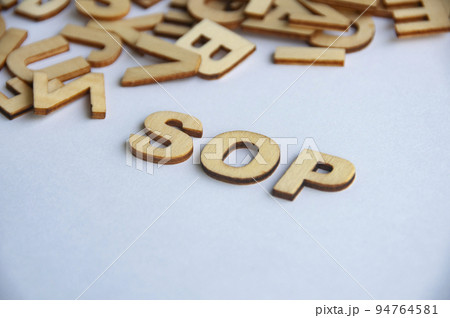 Standard operating procedures wooden text on while cover background. Social distancing concept. 94764581