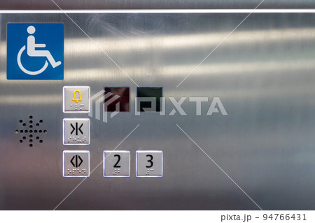 Image of disabled lift button. Stainless steel elevator panel push buttons for blind and disability people.  Image of disabled lift button. Stainless steel elevator panel push buttons for blind and disability people.  94766431