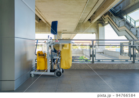 Professional Cleaning Trolley equipment is parked at the outdoor field and ready for everyday use. Professional Cleaning Trolley equipment is parked at the outdoor field and ready for everyday use. 94766584