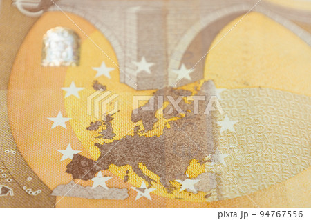 Europe map on a fifty euro banknote bill. Concept of uniting European countries Europe map on a fifty euro banknote bill. Concept of uniting European countries 94767556