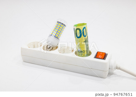 Fifty euro banknote plugged into the power strip, light bulb. Expensive electricity prices concepts Fifty euro banknote plugged into the power strip, light bulb. Expensive electricity prices concepts 94767651