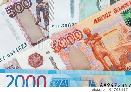 Russian rubles background. Money background and texture. Banknotes of different denominations 94768417