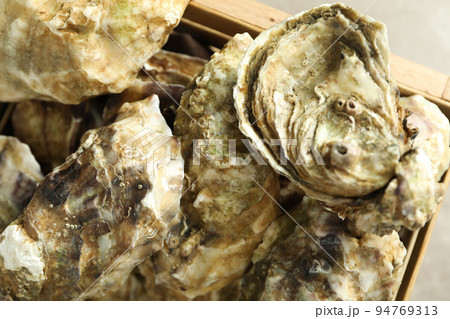 Concept of delicious seafood, oysters, close up Concept of delicious seafood, oysters, close up 94769313