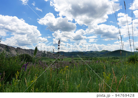 East Kazakhastan landscape, mountains and fields East Kazakhastan landscape, mountains and fields 94769428