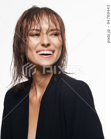 Happy smiling young woman with Wet Hair. Beautiful laughing Lady 94769443