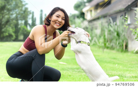 happy moment of woman and dog at home. happy moment of woman and dog at home. 94769506