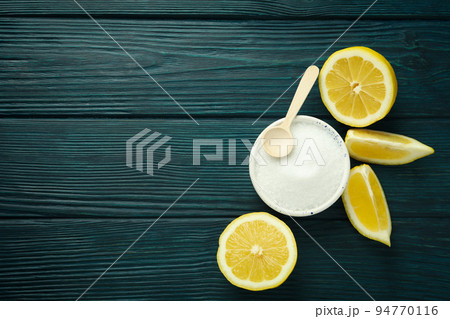 Concept of household cleaners with lemon acid Concept of household cleaners with lemon acid 94770116