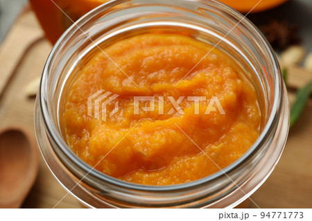 Concept of tasty food, pumpkin jam, close up Concept of tasty food, pumpkin jam, close up 94771773