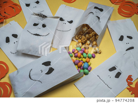 preparing Halloween treats for children preparing Halloween treats for children 94774208