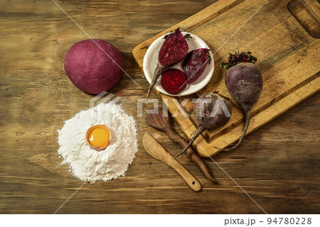 Purple dough bun for noodles with ingredients on the table. Purple dough bun for noodles with ingredients on the table. 94780228