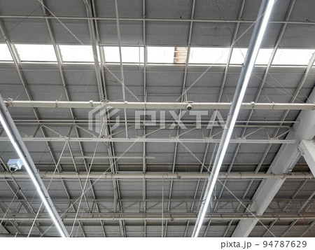 ventilation cooling pipe systems under the ceiling in an industrial building. 94787629