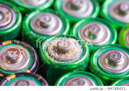 Corroded old batteries aa close-up Corroded old batteries aa close-up 94788451