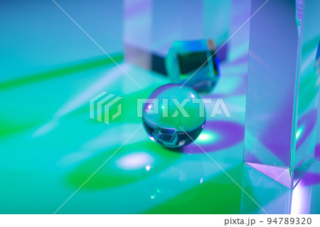 Glass crystal prism. Multicolor light effect 94789320
