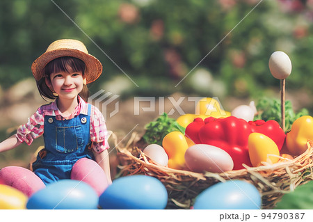 3D render of cute little girl peasant in garden full of Easter eggs. 94790387