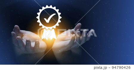 Businessman showing sign of leading service, quality assurance, warranty, standardization, ISO certification and standardization concept. Businessman showing sign of leading service, quality assurance, warranty, standardization, ISO certification and standardization concept. 94790426