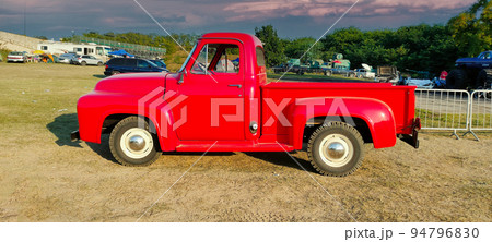 Red american farm car with nature background 94796830
