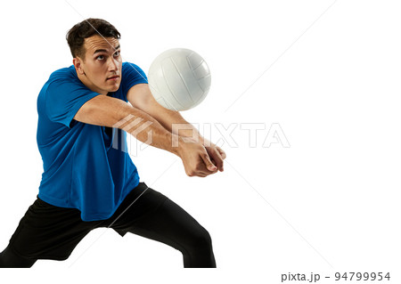 Closeup of young man, volleyball player playing volleyball isolated on white studio background. Sport, gym, team sport, challenges 94799954