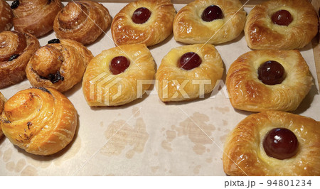 freshly baked danish pastry with apricot jam fruity jelly super delicious warm fresh buttery baked pastries with apricot and peach 94801234