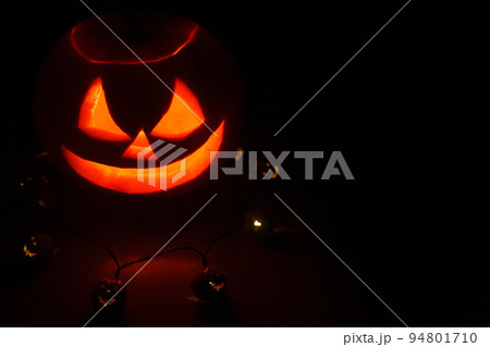 Jack o lantern in the forest by night. Halloween concept.. Jack o lantern in the forest by night. Halloween concept.. 94801710