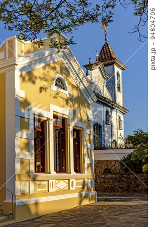 Historic baroque church next to a yellow neoclassical building in Diamantina Historic baroque church next to a yellow neoclassical building in Diamantina 94804706