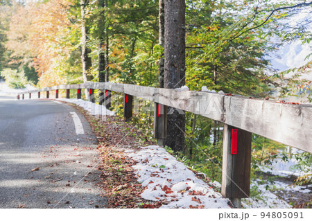 Wooden bump stop in the autumn forest in Slovenia Wooden bump stop in the autumn forest in Slovenia 94805091