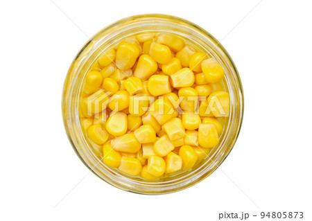 Jar of canned sweet corn, isolated. Pickled sweet corn on white. Top view. 94805873