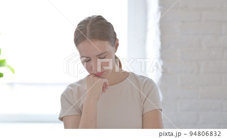 Tired Woman Sleeping while Sitting in Creative Office Tired Woman Sleeping while Sitting in Creative Office 94806832