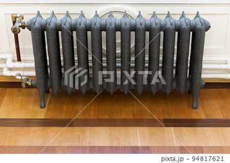 Wintage gray cast iron steam heating radiator, front view 94817621