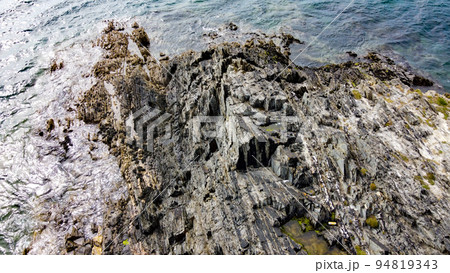 Rocks on the seashore. Geological formations. View from above. 94819343