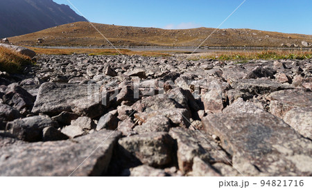 Natural paving stones made of stones in mountains 94821716