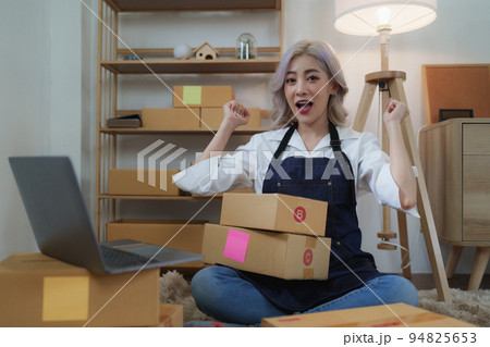 Asian SME business woman working at home office. online shopping concept. 94825653