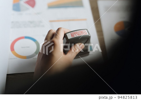 Business Accountant woman Hand Stamping On Approved Contract Form. finance concept Business Accountant woman Hand Stamping On Approved Contract Form. finance concept 94825813
