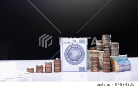 Money Coin stack to Washing Machine to laundering to big Investment Asset. Laundry illegal money Concept. Financial Wealth Tax economy is fraud dirty dollar to Success rich business man, copy space 94834326