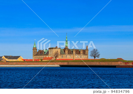 View of Kronborg Castle and Oresund strait in Helsingor (Elsinore), Denmark View of Kronborg Castle and Oresund strait in Helsingor (Elsinore), Denmark 94834796