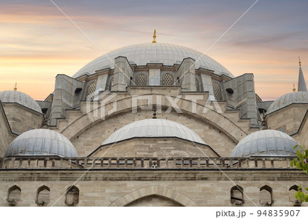 Sunset shot of domes of Ottoman era imperial Suleymaniye Mosque, second largest mosque in the city, Istanbul, Turkey 94835907