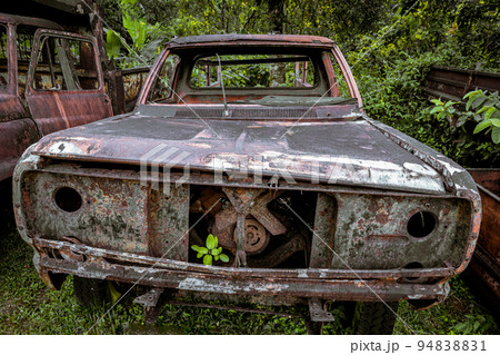 Front view old vintage truck car wreck used to transport ore from the mine to the steelworks. 94838831